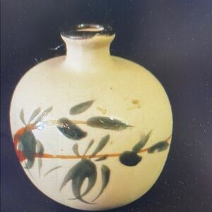 Elegant Cream Vase with Green Leaf Design